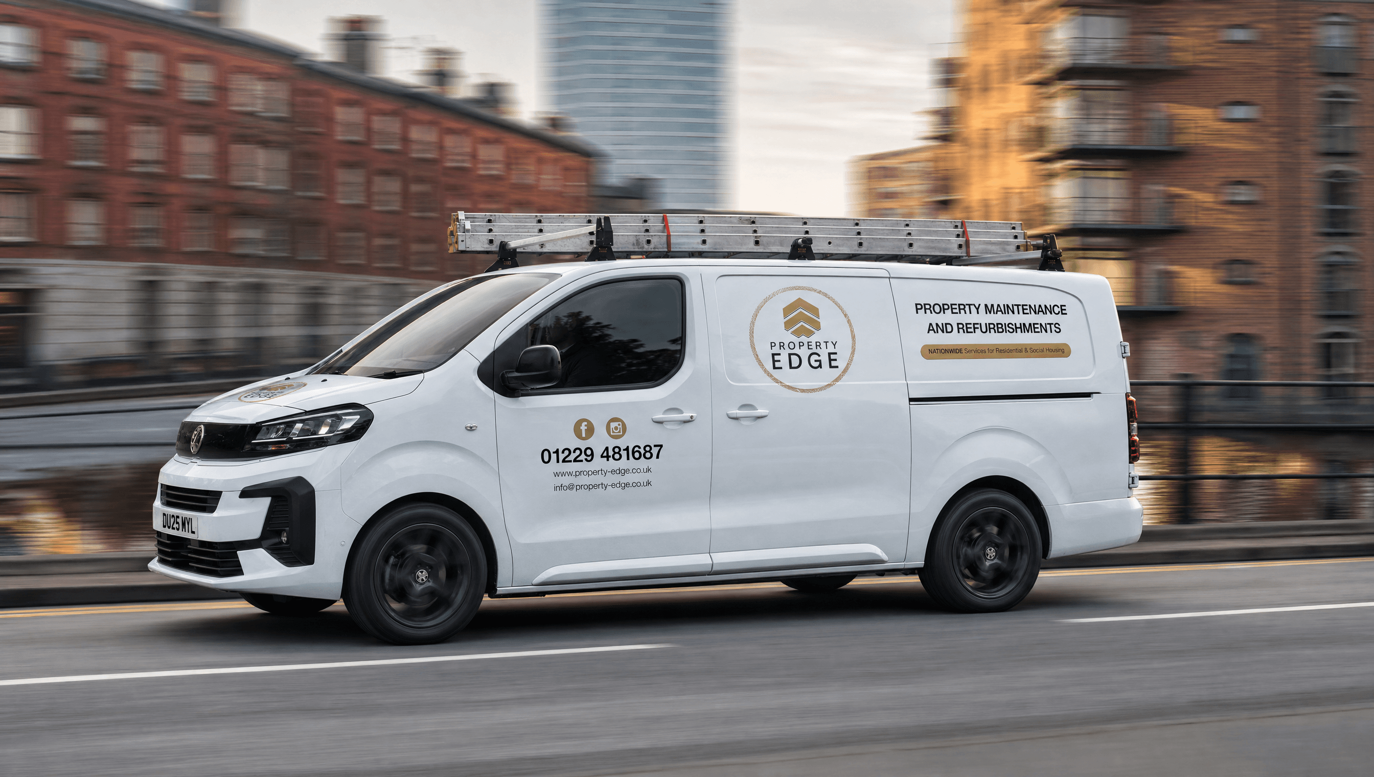 Property Edge Vauxhall Vivaro driving at speed through a city street with motion-blurred background