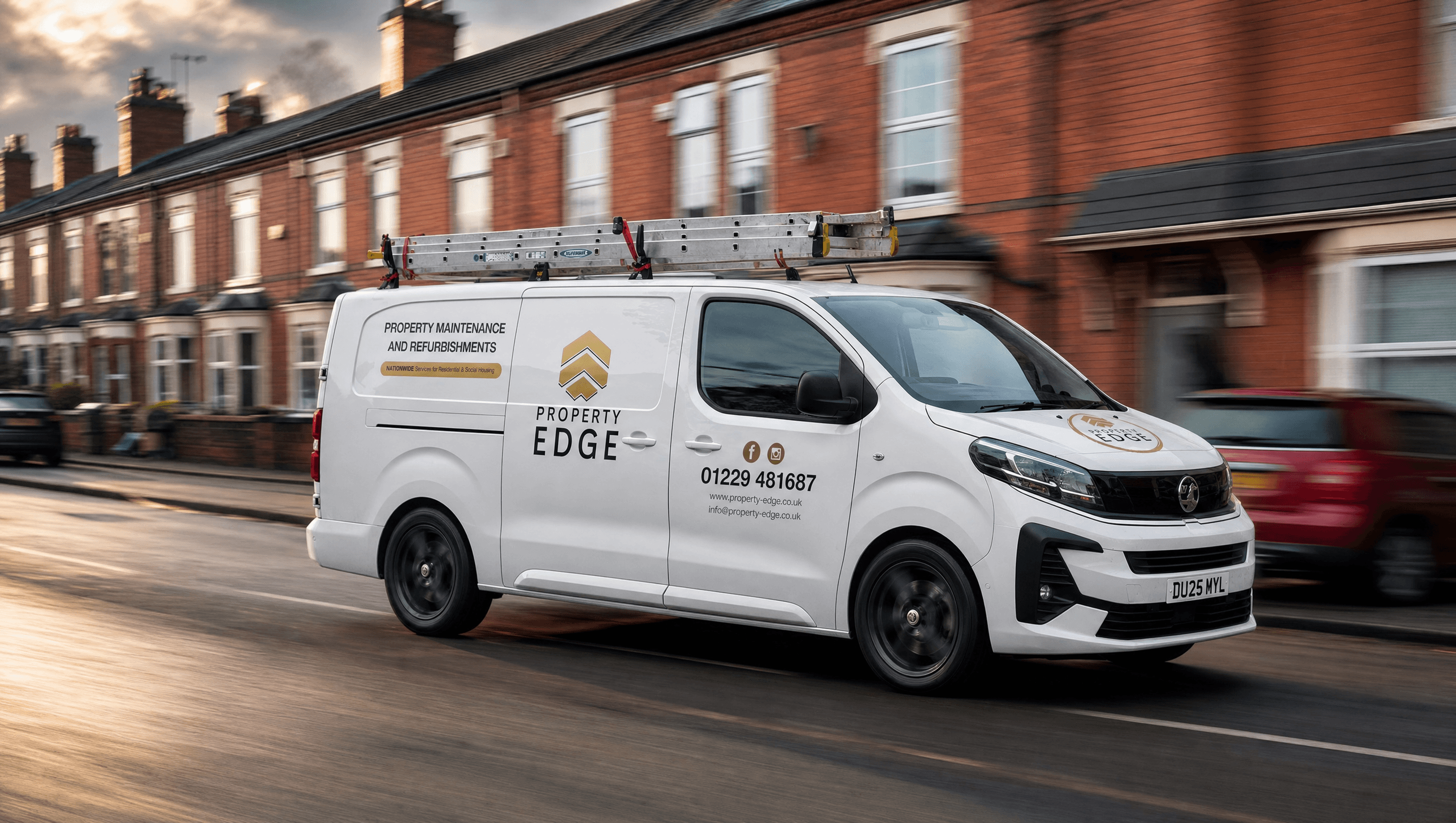 Property Edge Vauxhall Vivaro driving along a Midlands red-brick terrace street at golden hour